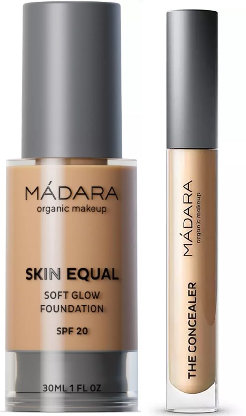 Zwei Makeup-Produkte von Madara: Foundation und Concealer in hellen Tönen mit silbernen Verschlüssen.
