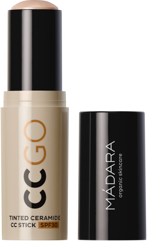 Beige sävytetty ceramide CC-tikku, jossa on musta kansi ja mustavalkoinen etiketti, edistää orgaanista ihonhoitoa.