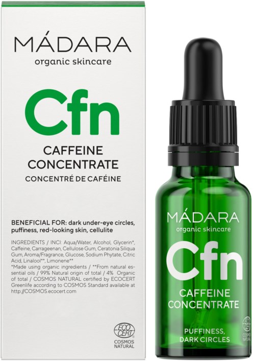 En grøn glasflaske med dråpetænger, mærket 'MÁDARA Caffeine Concentrate' for mørke rander og hudproblemer.