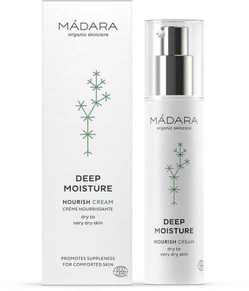 A white box and a pump bottle of Madara Deep Moisture Nourish Cream for very dry skin. Simple design with green plant graphic.