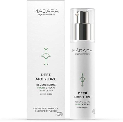 A white bottle of Mádara Deep Moisture Night Cream with a silver pump, and its box showing the product name and tree logo.