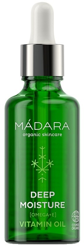 Grønn glassflaske med pipette, merket 'MÁDARA DEEP MOISTURE VITAMIN OIL'.