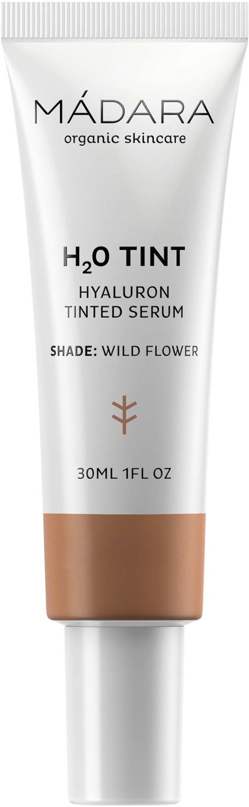 Eine weiße Tube mit braunem Boden, enthält ein Hautpflegeprodukt namens H2O TINT mit Hyaluronsäure, Farbton Wildblume.