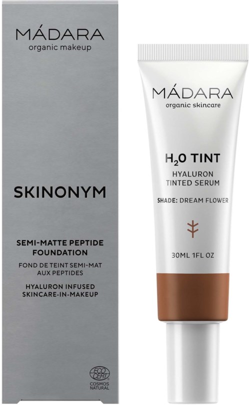 Ein Hautpflege-Serum in einer weißen Tube mit braunem Band und einer grauen Schachtel mit 'MÁDARA' und 'SKINONYM' Beschriftung.