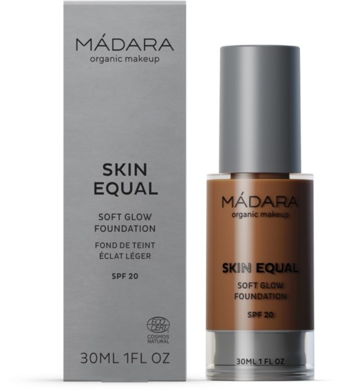 Eine Foundation-Flasche mit silberner Kappe und brauner Flüssigkeit, neben einer grauen Box mit 'MÁDARA' beschriftet.