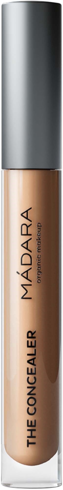 Ein Concealer-Roller mit silberner Kappe und beigefarbener Flüssigkeit, gekennzeichnet mit 'The Concealer' von MÁDARA.