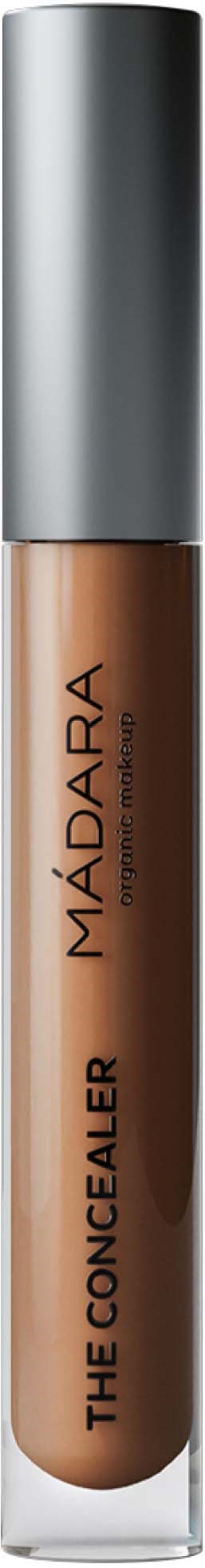 Peiteaineputki hopeanvärisellä korkilla ja beigellä nesteellä, merkinnällä 'MÁDARA THE CONCEALER'.