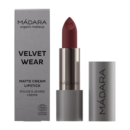 A matte cream lipstick in a silver tube, with packaging that says 'Velvet Wear' and 'Madara'.