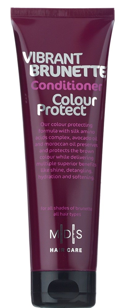 En lila och rosa tub med hårbalsam som heter Vibrant Brunette, för brunt hår. Den nämner färgbevarande och vård.