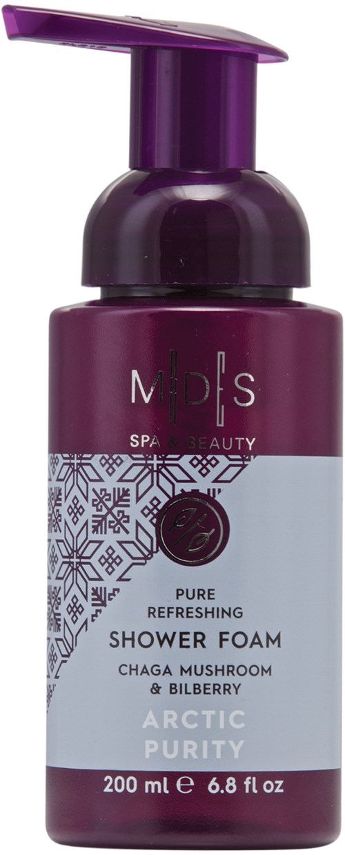 En lila flaska med duschskum med pump, märkt som chaga svamp och blåbärssmak från Mods Spa & Beauty.