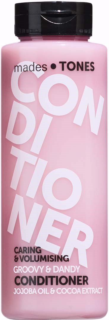 A pink bottle of conditioner with black cap, labeled as containing caring and volumising ingredients, with jojoba oil and cocoa extract.