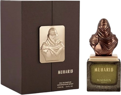Butelka perfum w kształcie osoby z kapturem, obok eleganckie pudełko z napisem "MUHARIB" i "MAISON."