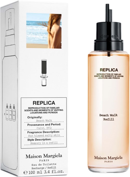 A perfume bottle labeled 'Beach Walk Refill' and a white box with a small screen showing a person at the beach.