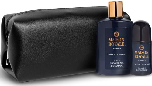 En svart väska för toalettartiklar med två flaskor av Maison Royale Homme duschgel och deodorant framför.