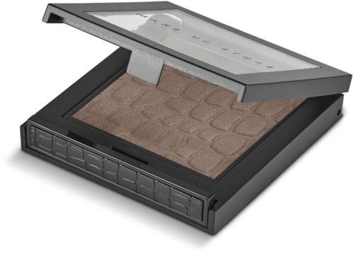 A makeup palette with eyeshadow shades in a black case and a clear lid. Beneath is a mirror.
