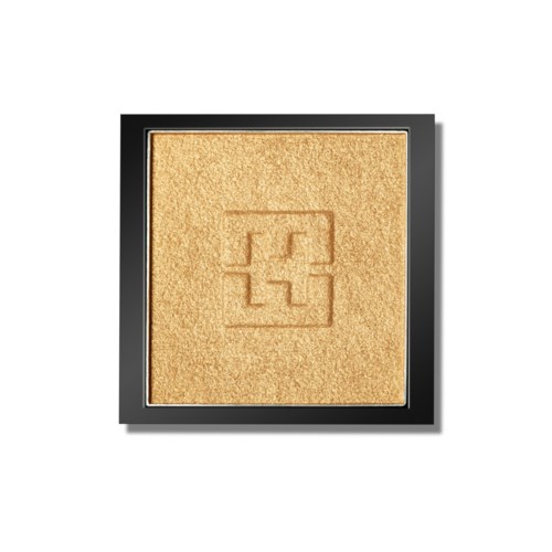 A makeup powder in a black case with a gold-colored powder imprinting a pattern.