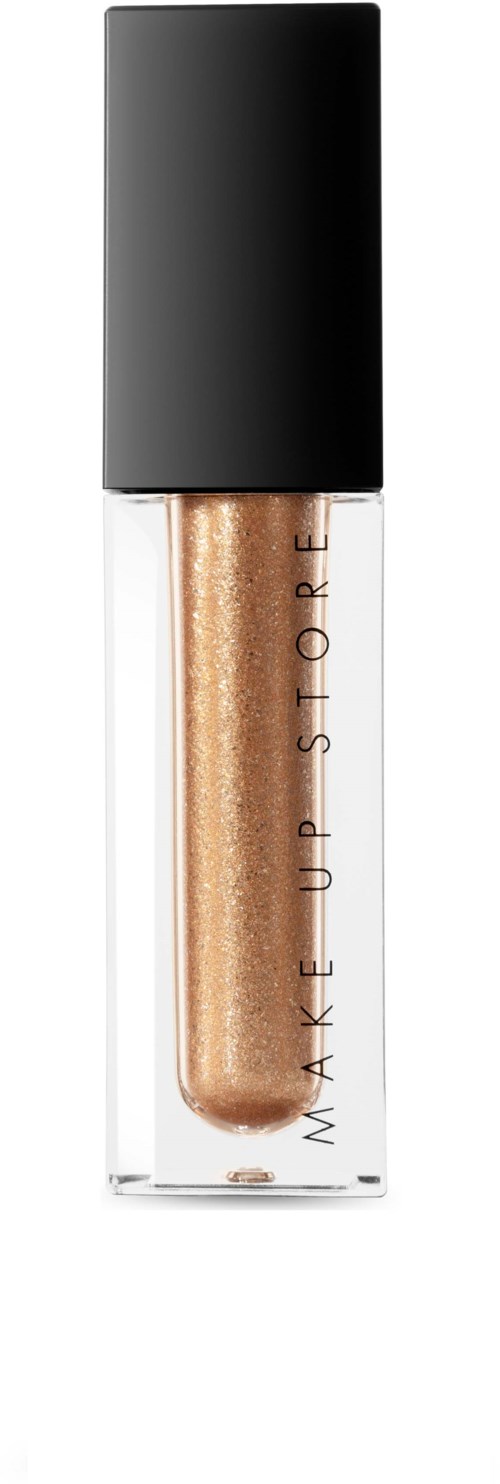 A small tube with a black cap, containing shiny gold lip gloss from Make Up Store.