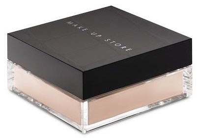 En svart låda med orden "MAKE UP STORE" på toppen, som innehåller en lättfärgad makeupprodukt inuti.