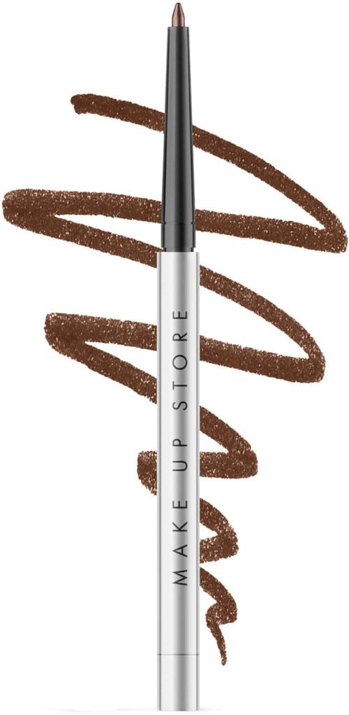 Pędzelek do makijażu z brązowym kolorem, z nakrętką i nazwą marki Make Up Store.