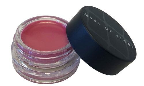 Aabnet pink kosmetikglas med sort låg, der siger "MAKE UP STORE".