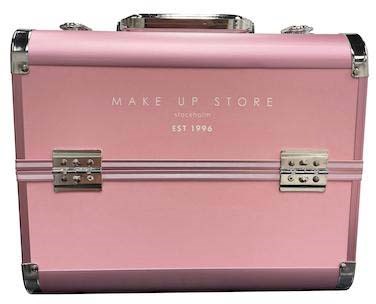 En rosa sminkväska med metalldörrar och lås, och orden "MAKE UP STORE" på toppen.