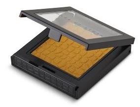 A scanner with a lid open, showing a yellowish document or film inside, used for copying or digitizing.