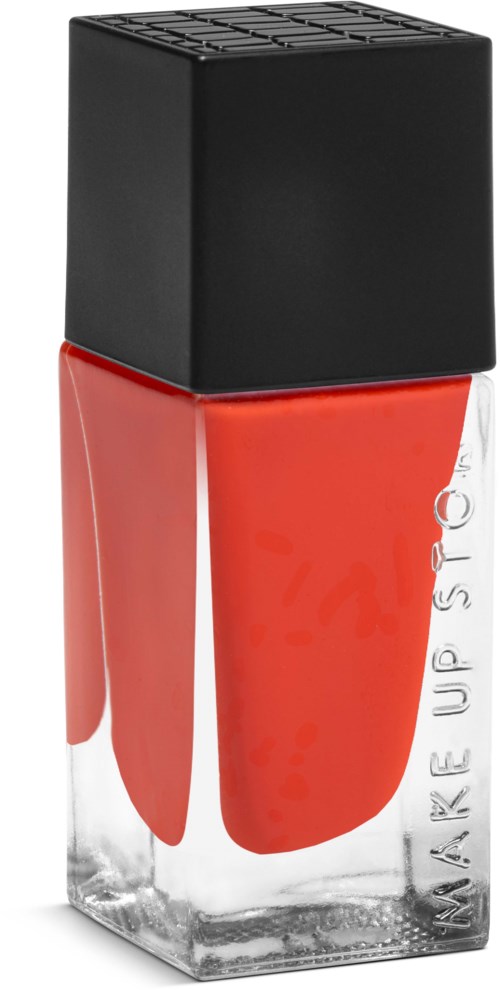 En flaska orange nagellack med svart lock, står upprätt.