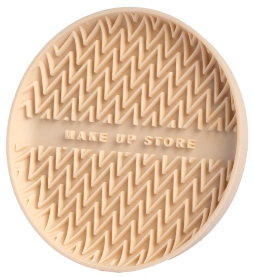 Okrągły beżowy pojemnik silikonowy z wzorem zygzak i napisem "MAKE UP STORE" na środku.