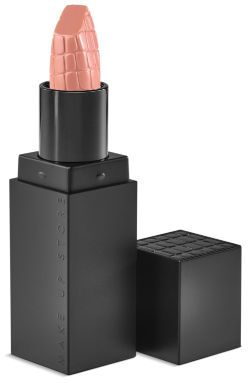 A lipstick in a black case with a textured, pale pink creative design on the lipstick itself.