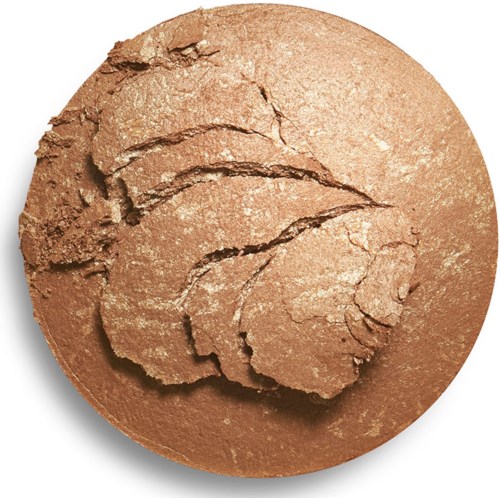 Ett runt makeup-compact visas, öppet för att visa pressad puder inuti.