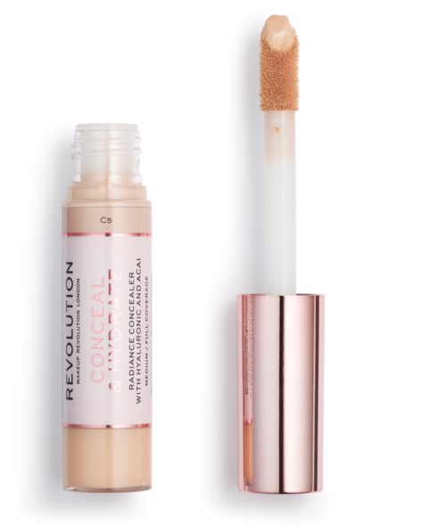 Korektor w sztyfcie z gąbką aplikacyjną w różowo-białym opakowaniu od Revolution Beauty.