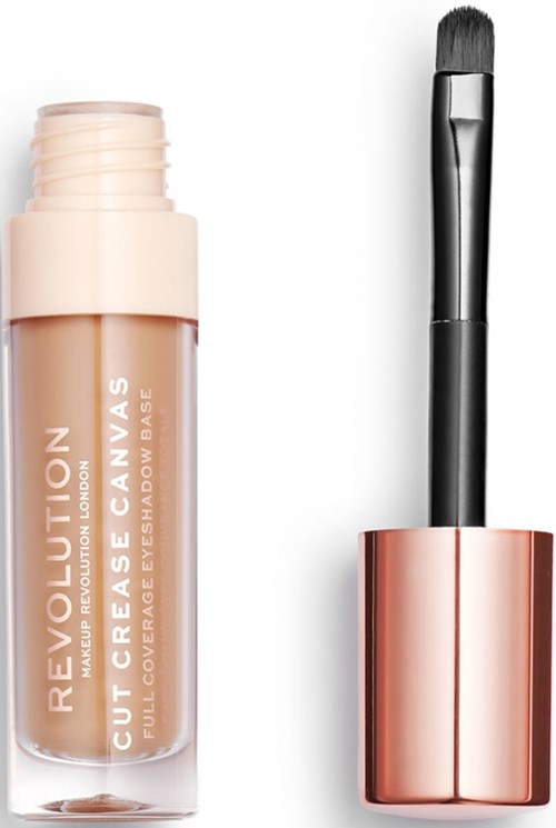 En beige läppstiftstubb med avtaget lock, bredvid en svart och roséguldig makeupborste.