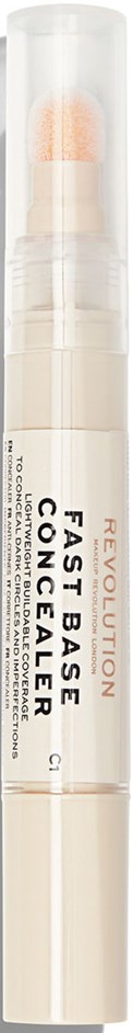 En vit pinne med en beige tipp, märkt som 'Revolution Fast Base Concealer.' Det är en makeupprodukt i ett tydligtlock.