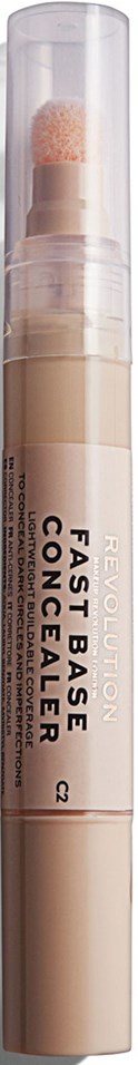 En beige crayonliknande pinne med klar hatt, märkt "Fast Base Concealer" i svart text.