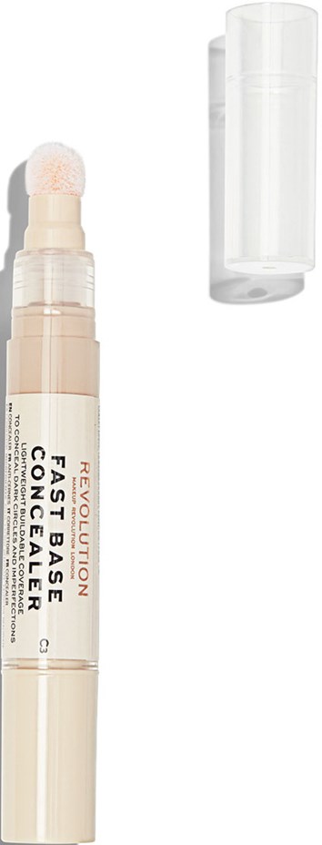 En beige makeuppenna märkt 'Revolution Fast Base Concealer' med genomskinlig kapsyl, visar svamptipsen. Den står upprätt.