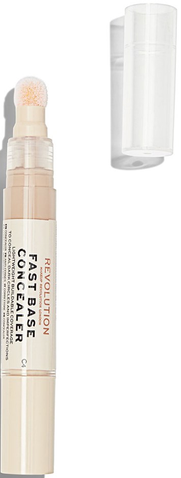 En concealerstift med vit och beige design och ett tydligt lock, märkt 'Revolution Fast Base Concealer' på kroppen.