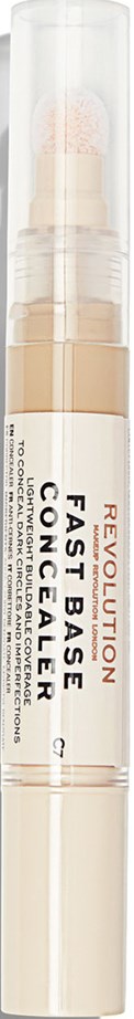 En concealerstift med genomskinlig lock, märkt 'Revolution Fast Base Concealer' i vitt och orange text.