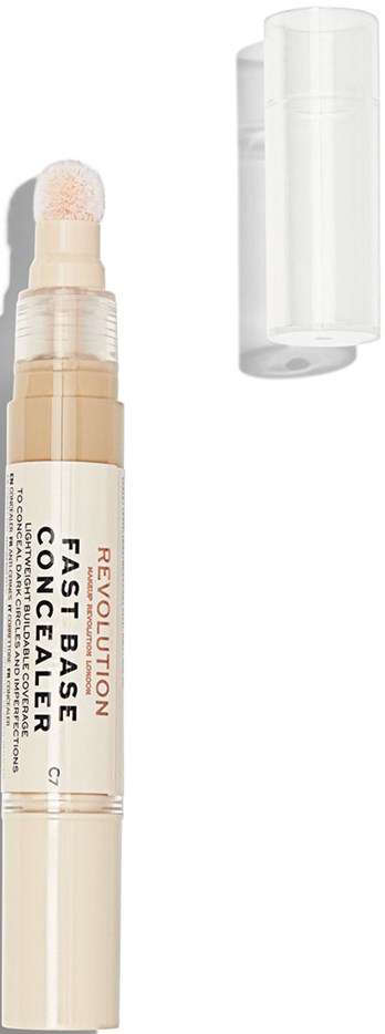 En beige makeuppenna med transparent lock, märkt 'Revolution Fast Base Concealer' och en applikationssvamp på toppen.