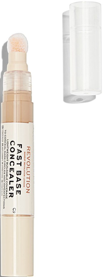 Ett beige stycke med vit lock, märkt 'Revolution Fast Base Concealer,' och dess klara lock är borttaget.