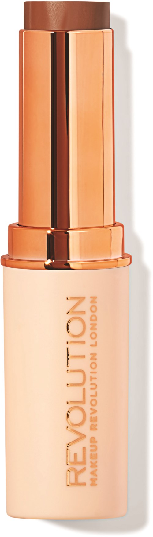 En flaska makeupfoundation från Revolution med guldfärgad och beige design.