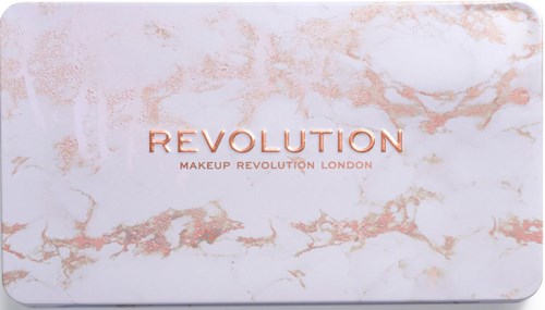 A marble-patterned makeup palette with 'REVOLUTION' and 'MAKEUP REVOLUTION LONDON' written on it.
