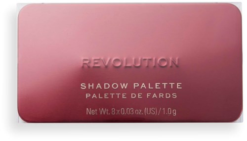 Vaaleanpunainen meikkipaletti, jossa lukee "Revolution Shadow Palette" ja painotiedot.