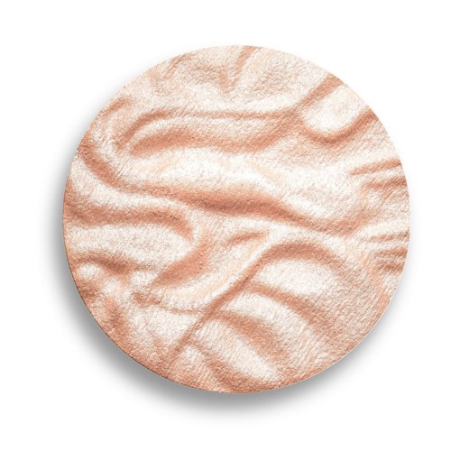 A round makeup powder with a textured, light pink surface and wavy patterns.