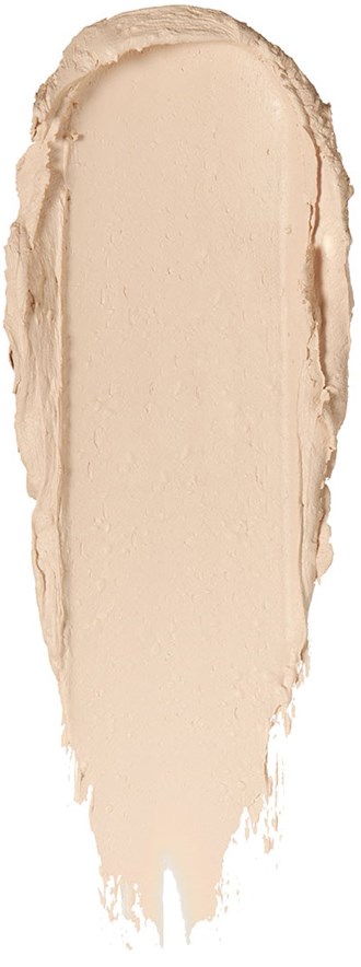 En stor, oval form av makeupfoundation smutsad på vit bakgrund.