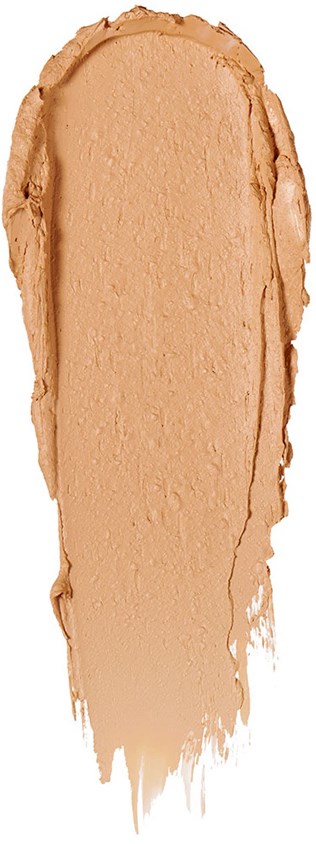 En mängd av beige-foundation eller kräm spridd vertikalt med ojämna kanter och en smalare nederdel.