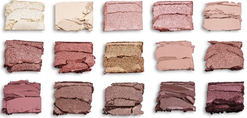 En samling av rosa, beige och bruna krossade läppstifts- eller ögonskuggprov, arrangerade i rader.