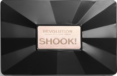 En sminkproduktkompakt med svart design, rosa spegel och text: Revolution Makeup Revolution London SHOOK!.