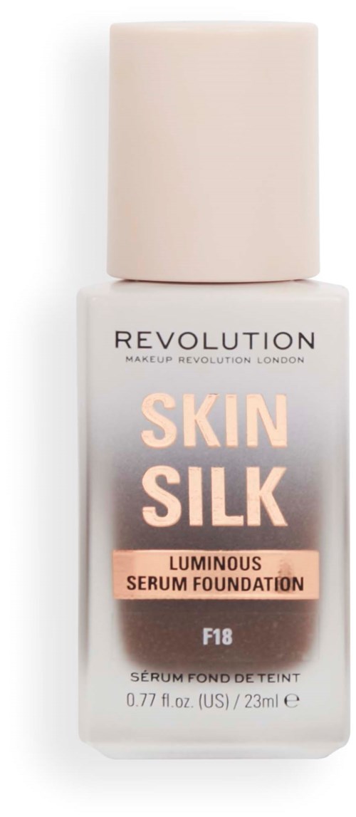 Eine weiße Flasche mit hellrosa Deckel, gekennzeichnet 'Skin Silk Luminous Serum Foundation' von Revolution, F18, 23ml.