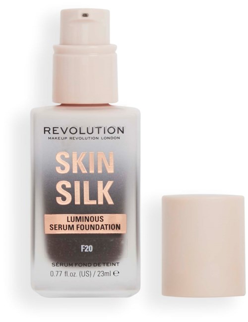 Kleine Flasche mit Revolution Skin Silk leuchtender Serum-Foundation mit Pumpe und Deckel.