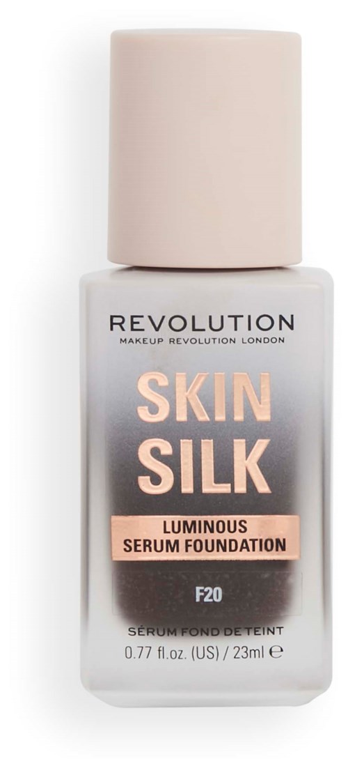 Eine weiße Flasche Revolution Skin Silk strahlende Serumgrundierung mit beigem Deckel.